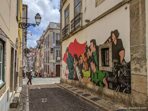 Wandmalerei mit Arbeiterbild in Lissabon